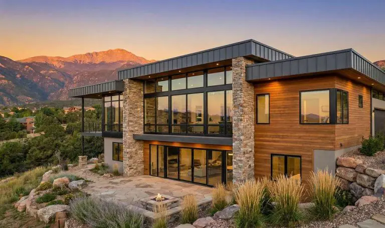 Modern mountain home floor plans Colorado Springs with contemporary glass and stone architecture and Pikes Peak views